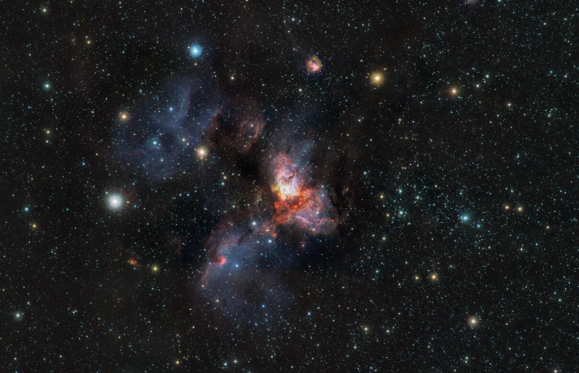 This is an 80-million-pixel picture of the star cluster RCW 38, located 5500 light-years away in the constellation Vela. RCW 38 is a young cluster containing about 2000 stars, and is bursting with star-forming activity. The picture was taken with ESO’s Visible and Infrared Survey Telescope for Astronomy (VISTA), operating in Chile’s Atacama Desert. It shows a mixture of gas, dust and stars, creating an extravagant, yet spectacular landscape. As VISTA observes infrared light, it is able to peer through most of the dust in this region, which would block our view when observing in visible light. Behind the dust, VISTA is showing young stars within dusty cocoons and cold ‘failed’ stars known as brown dwarfs, thus revealing the secrets within these young stellar nurseries. Credit: ESO/VVVX survey